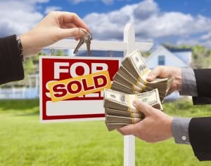 sold sign showing cash for keys