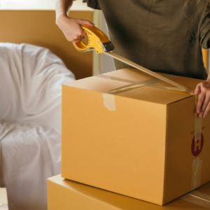 person packing boxes