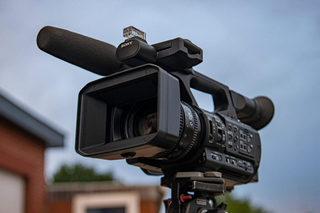 video camera taking real estate sales video