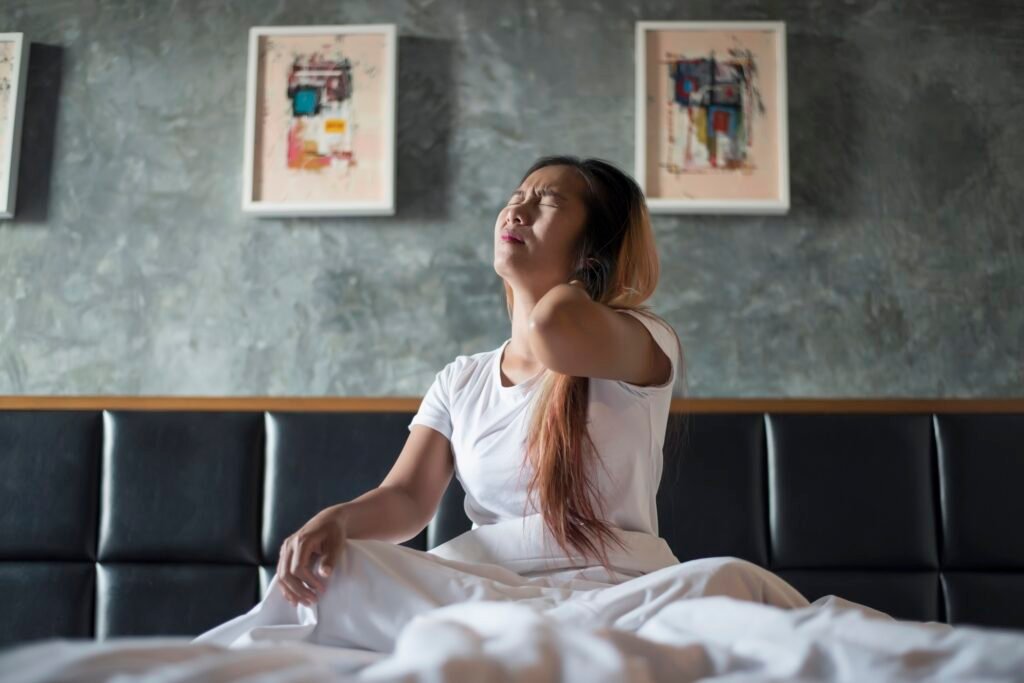 Young woman who just waked up after bad sleep.